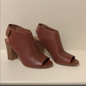 Women’s open toe heeled bootie. Size 7